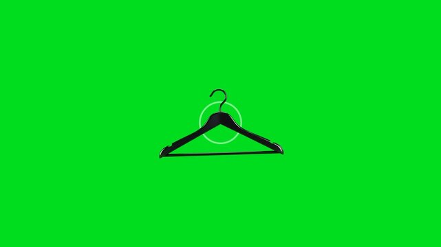 A single black plastic clothes hanger centered against a vibrant green screen