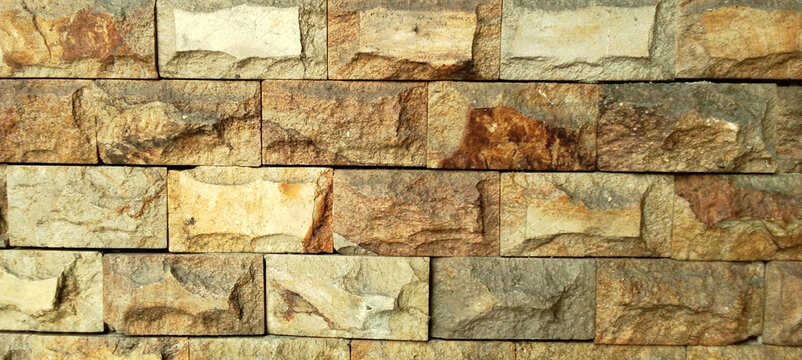 Texture and Background of Natural Sandstone Wall Tiles