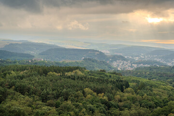 Fototapeta premium View of the mountains and Kislovodsk from the observation decks of the Kislovodsk Park. Evening sunset over the mountains of Kislovodsk.