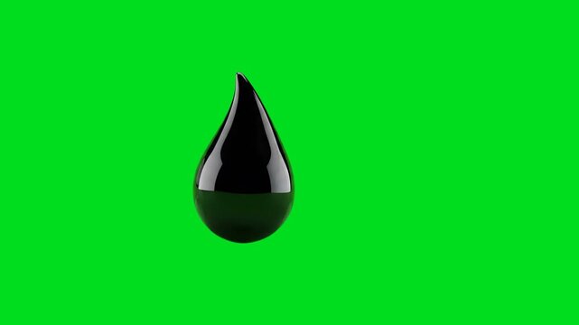 A single glossy black liquid drop isolated against a bright green background