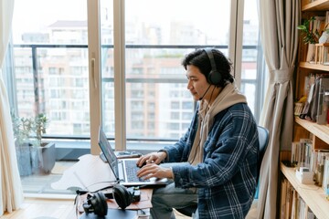 Fototapeta premium Japanese Apartment Workspace With Laptop User