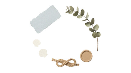 Minimalist circular flat lay with eucalyptus branch and paper. Natural organic frame with rope knot and wax seal. Elegant botanical border on white. © Graphics Stock