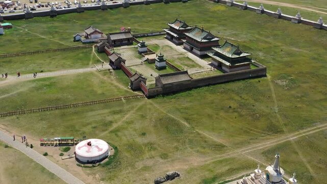 Aerial view of Erdene Zuu Monastery with its traditional temples, stupas, and surrounding defensive walls set in the vast Mongolian steppe in Kharkhorin, Ovorkhangai, Mongolia.