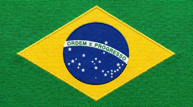 Detailed embroidery of the Brazil national flag badge showing textile texture for sports apparel branding, patriotic graphics, and travel marketing