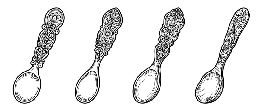 Antique ornate spoons with floral engraving, isolated