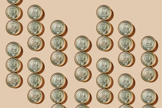 repeating pattern of unopened food cans