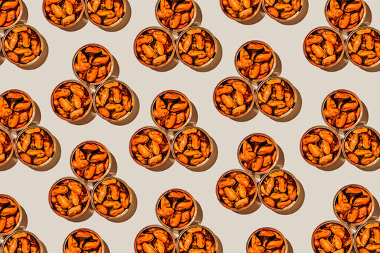 triangular pattern of mejillones en escabeche tins