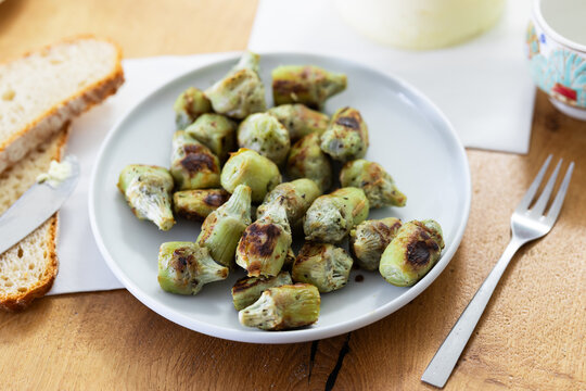 fried artichoke hearts on a plate