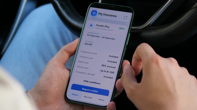 Person reviews a digital health insurance policy on a smartphone, highlighting mobile coverage management, medical benefits and the shift toward app-based insurance services.