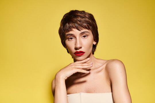 Charming beauty portrait of a young woman showcasing radiant skin and style