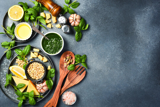 Italian cuisine. Pesto sauce and ingredients. Free space for text. Top view.