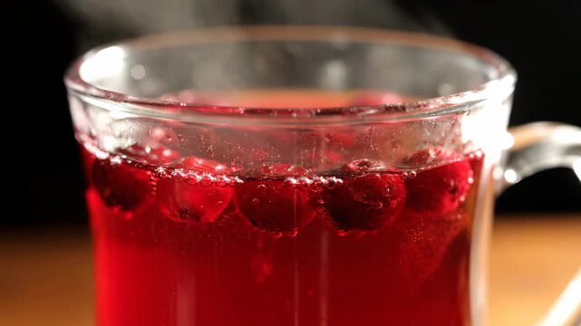 Russian hot berry compote drink in glass mug
