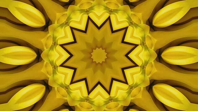 Vibrant yellow banana fruit slice kaleidoscope motion video displaying symmetrical tropical flower mandala geometric pattern background for video editing