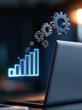 Digital transformation and business growth visualized with glowing bar chart and gears emerging from laptop