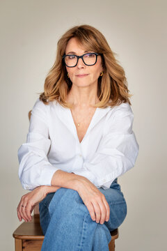 Portrait of confident businesswoman over white background
