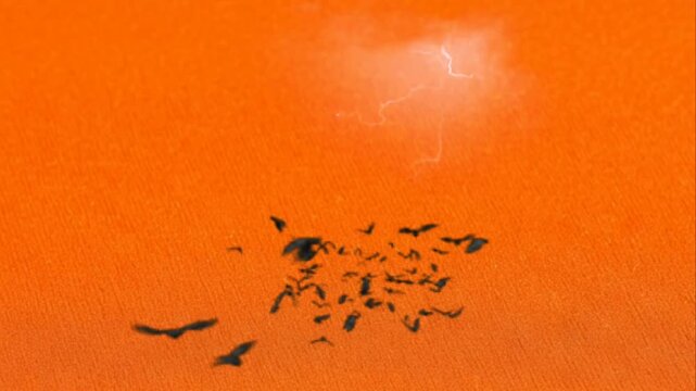 Abstract Orange Background with Lightning Effect and Dark Particle Elements