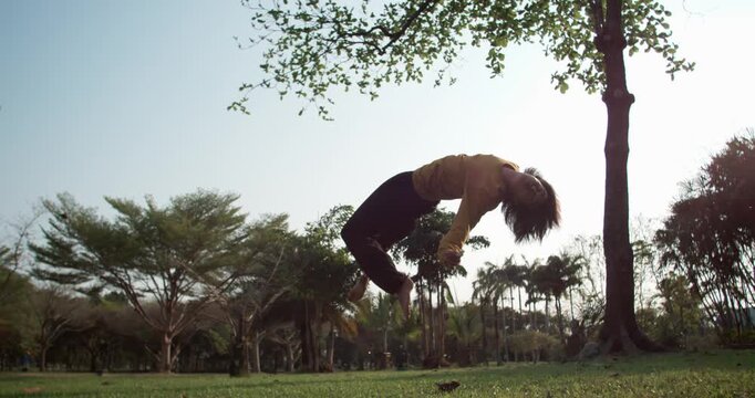 Cinematic time ramp adds style to this fluid parkour line. Slowmo 1000fps slow motion, capturing the dynamic flow of an Asian traceur combo with beautiful hang time. Concept: cinematic style dynamic