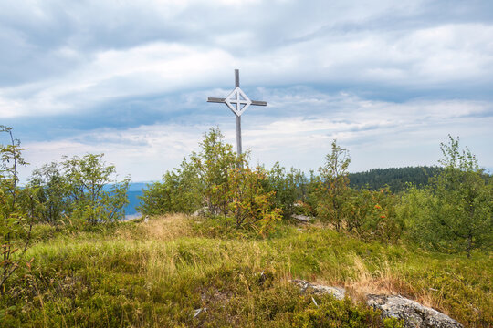 Summit Cross on Enzian Mountain with Scenic Landscape in the Bavarian Forest, Bavaria, Germany under Cloudy Summer Sky