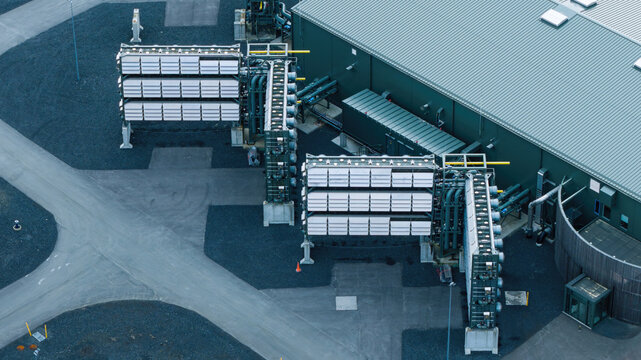Aerial view of the Direct Air Capture and Storage Plant featuring industrial carbon removal modules and piping infrastructure in Olfus, Sveitarfelagid Olfus, Iceland.