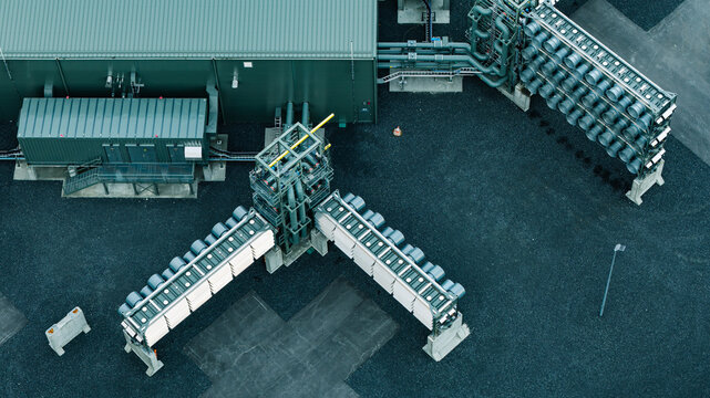 Aerial view of a Direct Air Capture and Storage plant featuring industrial fans and complex piping systems for carbon removal in Olfus, Sveitarfelagid Olfus, Iceland.