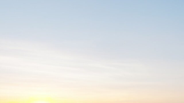 Commercial passenger airplane flying through a warm sunset sky, ideal for aviation, air travel, tourism, transportation, airline, and travel content.
