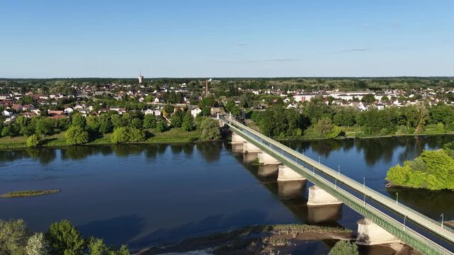 The iconic Pont Canal bridge crossing a wide river in Briare, France, aerial view.