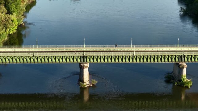 The iconic Pont Canal de Briare, a historic aqueduct bridge crossing the Loire River in Briare, France, aerial view.
