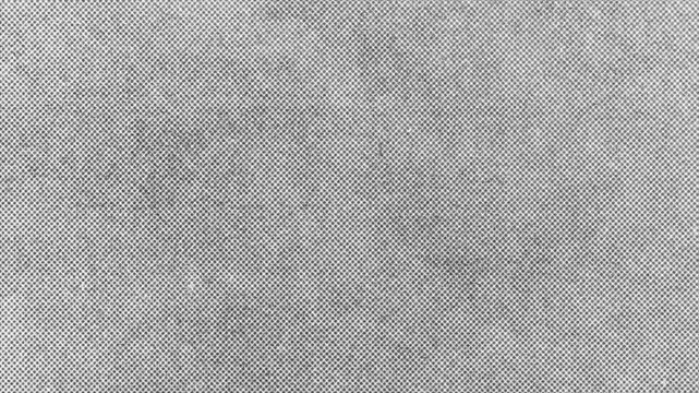 Black and white halftone dot texture overlay, vintage newspaper print effect, retro comic book pattern, monochrome background, grunge paper grain, noise video loop.