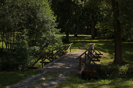 Wooden footbridge in public park at Tepla abbey in Tepla, Karlovy Vary Region, Czech republic,Europe
