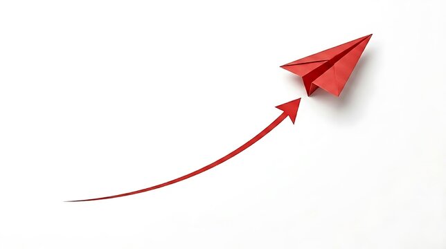 Red paper airplane flying upward along a curved arrow representing business growth and success