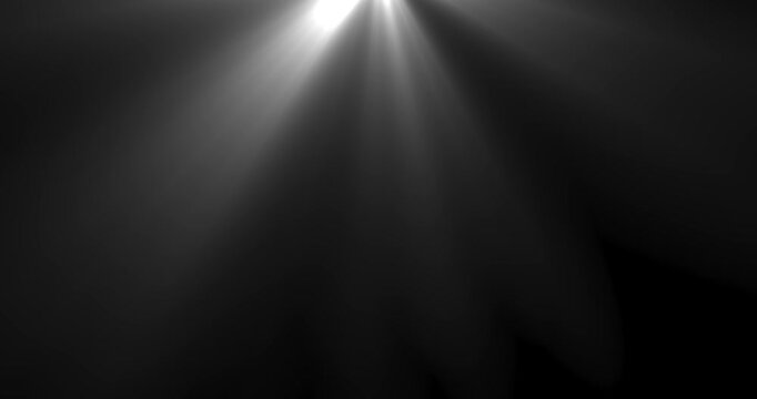 4k Resolution Video: Stage Lighting, Dramatic Illumination, Spotlight, Performance, Presentation And Cinematic Atmosphere Concept. White Animated Light Rays Shine From Above On Black Background 