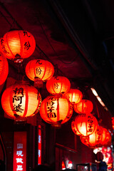 Fototapeta premium Jiufen old town with glowing red lanterns at night, Taiwan