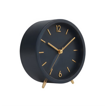 A black clock with gold hands and numbers on its face