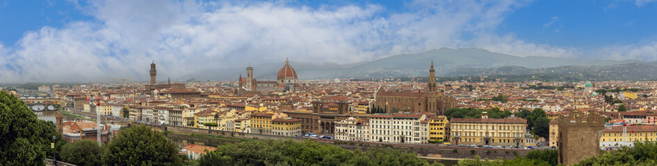 Fototapeta premium Panoramic view of historic Florence with Arno River and main landmarks from hill near Piazzale Michelangelo