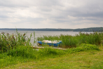 Naklejka premium Small village Nanosy and lake Naroch, Belarus