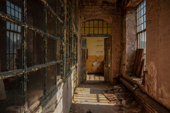 Abandoned old industrial textile research institute with laboratory chemistry glass, machinery workshop and factory hall