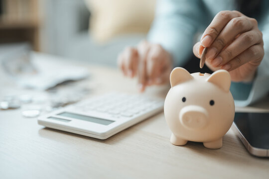 piggy bank saving with money coins; a piggy bank savings scene. piggy guides choices, bank frames meaning, and saving supports buyers. Clear visual context supports stock buyers. For useful context.