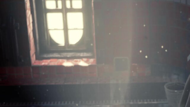 Sunlight streams through a window in a kitchen. Dust particles float in the air. The scene shows a cozy atmosphere with red tiles and kitchen tools visible.