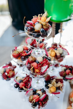 Food and drinks on corporate party table.