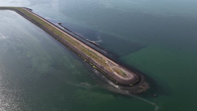 Aerial view of Schelphoek bay and surrounding coastal nature reserve in Zeeland, the Netherlands, with wetlands, water, dikes and natural landscape. Schelphoek is on Schouwen-Duiveland, not Zuid-Bevel