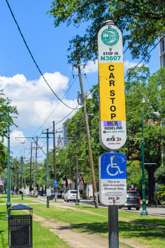 New Orleans, LA, USA - June 10, 2026: Vertical Image of Streetcar Stop Sign with ADA Accessible Streetcar Stop Sign on the St. Charles Avenue Streetcar Line