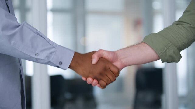 Cropped view male hands handshaking gesture working partners two unknown multiracial business men shaking hands Caucasian African businessmen handshake work welcome hiring candidate recruit in office