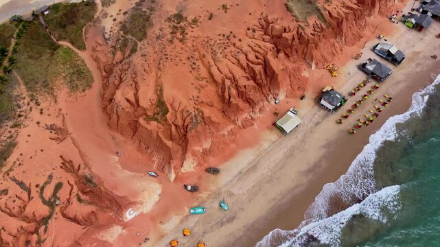 Aerial View of Textured Cliffs Meeting Sandy Beach, Northeast Brazil