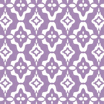 Seamless bohemian ethnic floral geometric pattern background in purple lavender color
