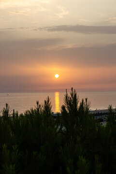 sunset on La Barrosa beach in Sancti Petri, Cadiz, Spain