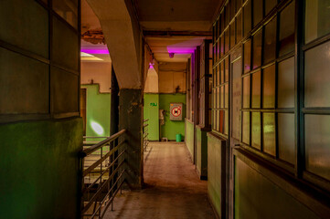 Fototapeta premium Abandoned old industrial textile research institute with laboratory chemistry glass, machinery workshop and factory hall