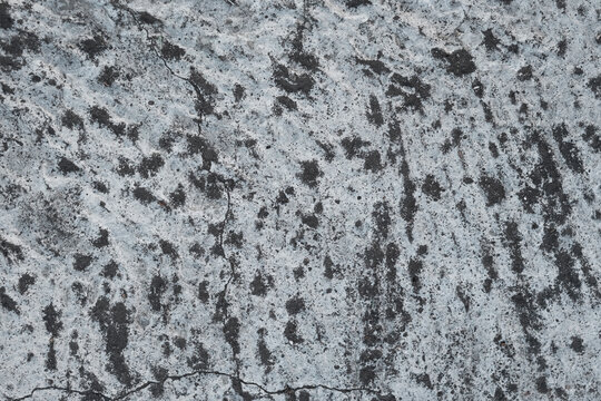 Grunge concrete texture with swirl marks, rough cement background