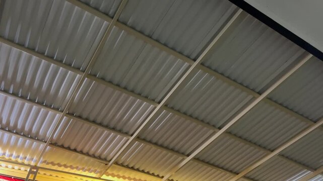 Horizontal view of lightweight steel roofing sheet in industrial building