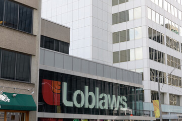Fototapeta premium exterior building facade and sign at Loblaw Toronto St Clair E a grocery store chain