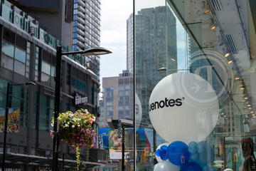 Fototapeta premium big balloon with sign inside display window of Bluenotes, a clothing store, located at 316 Yonge St, Toronto